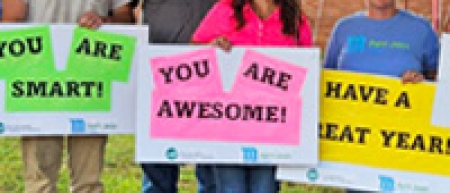 Employees Cheer on Local Students for Back-to-School Warm Welcome